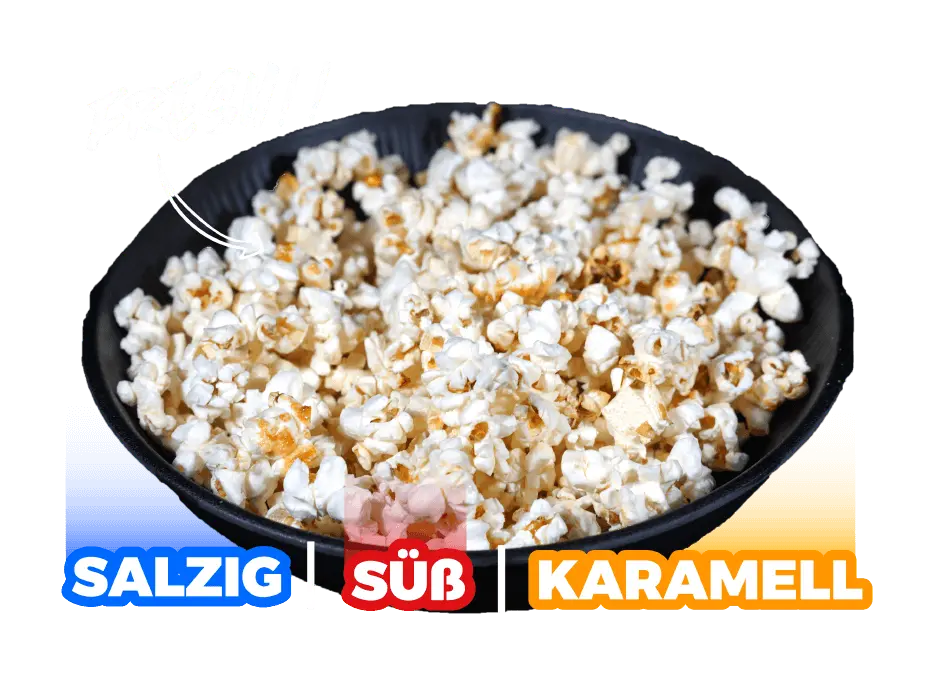 Popcorn in den Sorten salzig, süß und Karamell auf schwarzem Teller